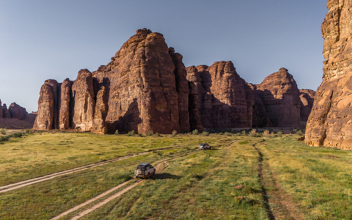 Traverse stunning Sharaan landscapes in a Defender 130